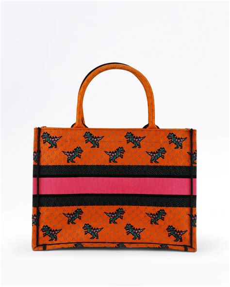 christian dior dinosaur book tote
